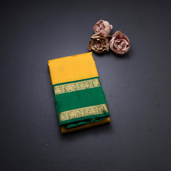 Mango Yellow Silk Saree With Peacock And Chakra Buttas And Rettapet Border