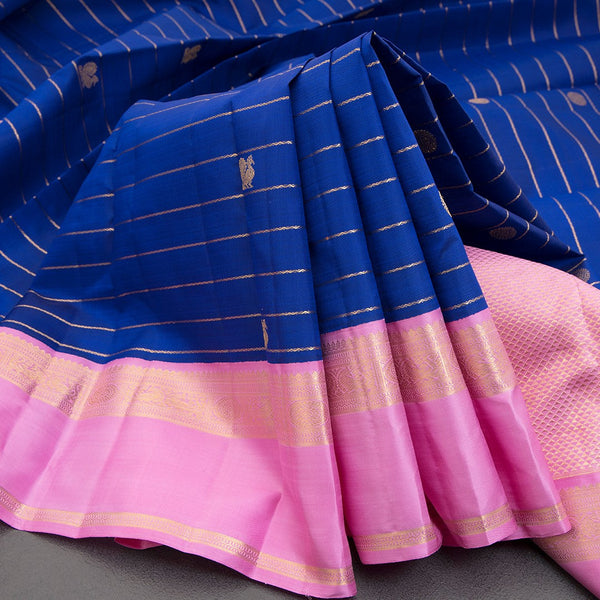 Ink Blue Silk Saree With Zig Zag Design And Peacock And Chakra Buttas And Pink Border