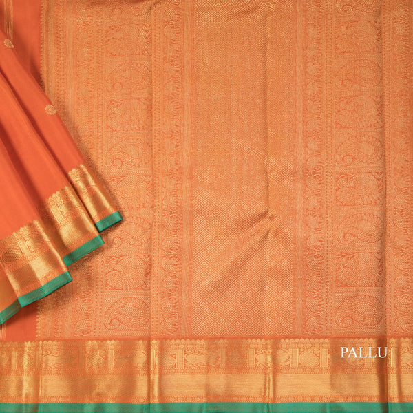 Rust Orange Silk Saree With Peacock And Chakra Buttas And Gold Zari Border