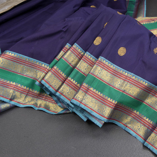 Dark Blue Silk Saree With Peacock And Chakra Buttas And Rettapet Border