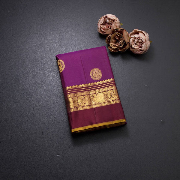 Magenta Silk Saree With Animal Motif On The Body And Zari With Thread Embossed Border
