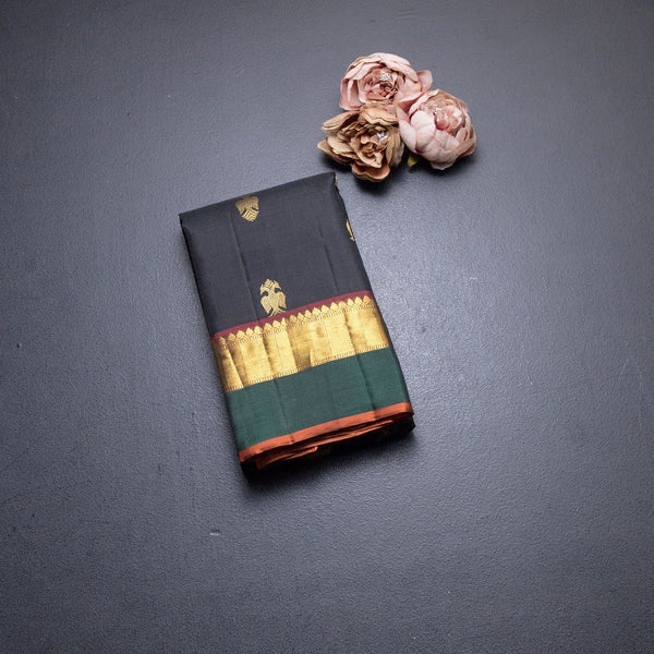 Black Silk Saree With Animal Zari Buttas And Contrast Pallu