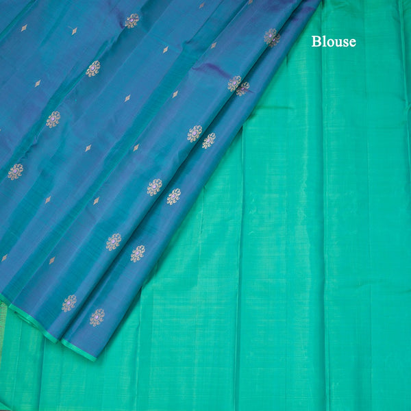 Shot Colour Borderless Silk Saree With Floral Zari Buttas On The Body