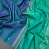 Shot Colour Borderless Silk Saree With Floral Zari Buttas On The Body