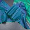 Shot Colour Borderless Silk Saree With Floral Zari Buttas On The Body