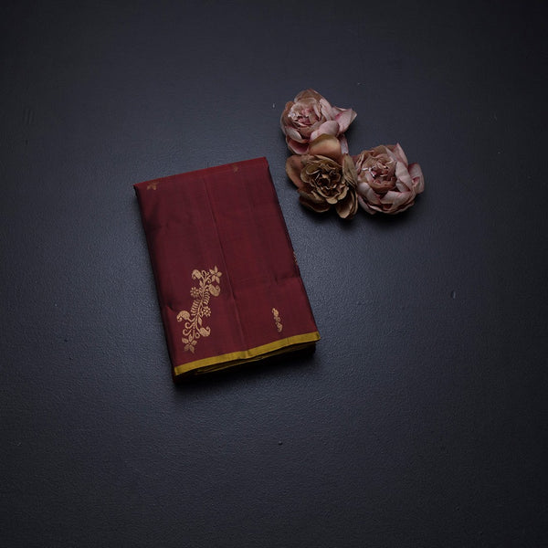 Maroon Borderless Silk Saree With Floral Zari Buttas On The Body