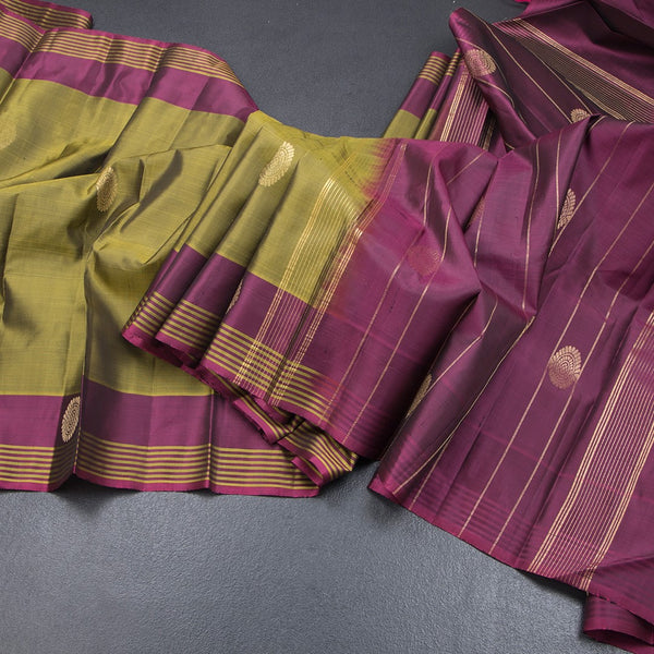 Olive Green Silk Saree With Chakra Buttas And Stripes Border