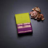 Lime Green Silk Saree With Chakra Buttas On The Body And Purple Zari Border