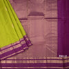 Lime Green Silk Saree With Chakra Buttas On The Body And Purple Zari Border