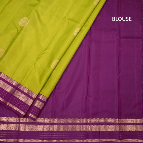 Lime Green Silk Saree With Chakra Buttas On The Body And Purple Zari Border