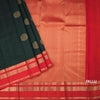 Bottle Green Silk Saree With Chakra Buttas On The Body And Red Zari Border