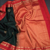 Bottle Green Silk Saree With Chakra Buttas On The Body And Red Zari Border