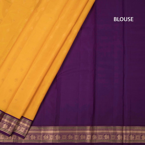 Mango Yellow Soft Silk Saree With Peacock Buttas On The Body And Purple Zari Border