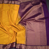 Mango Yellow Soft Silk Saree With Peacock Buttas On The Body And Purple Zari Border