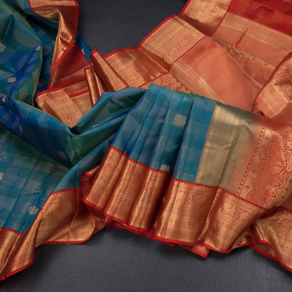 Peacock Blue Soft Silk Saree Checks With Peacock And Floral Design And Zari Border