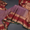 Dark Purple Soft Silk Saree With Multi Design On The Body And Rettapet Border