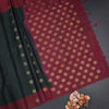 Bottle Green Soft Silk Saree With Floral Buttas And Maroon Border