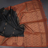 Black Soft Silk Saree With Floral Buttas And Paisley Border