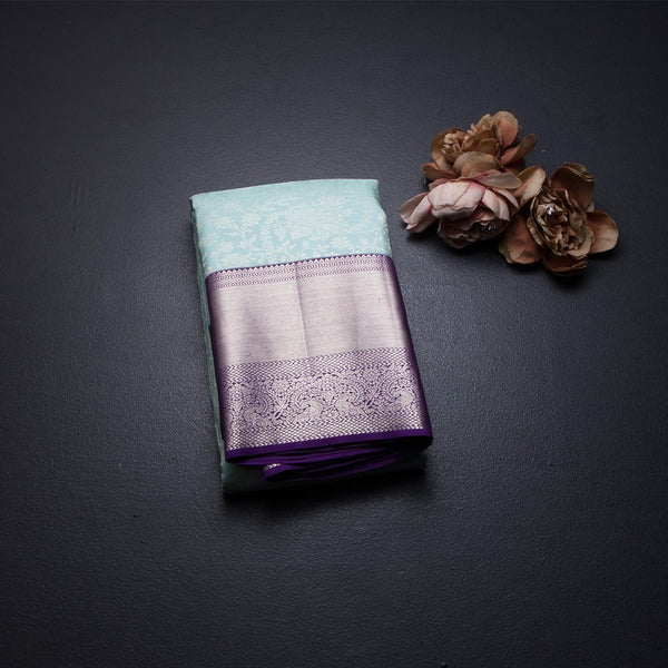 Powder Blue Brocade Silk Saree With Zari Border