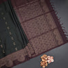 Bottle Green Soft Silk Saree With Floral Buttas And Brown Border