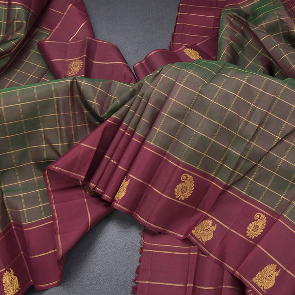 Shot Colour Checked Silk Saree And Peacock And Mango Buttas On Border