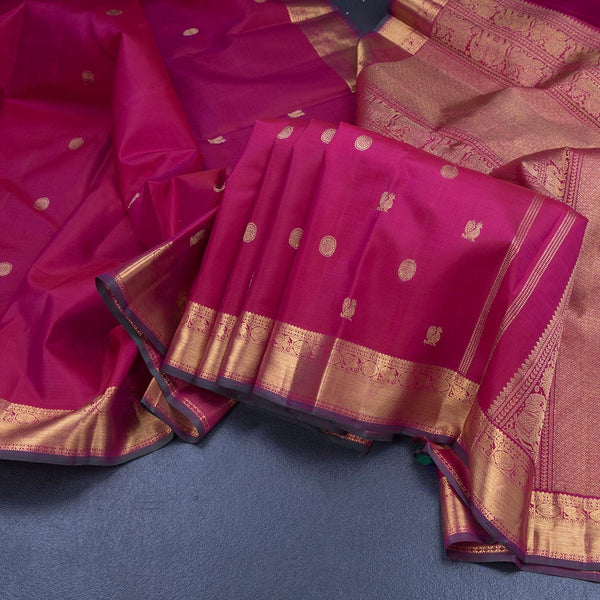 Reddish Pink Silk Saree With Peacock And Chakra Buttas And Gold Zari Border