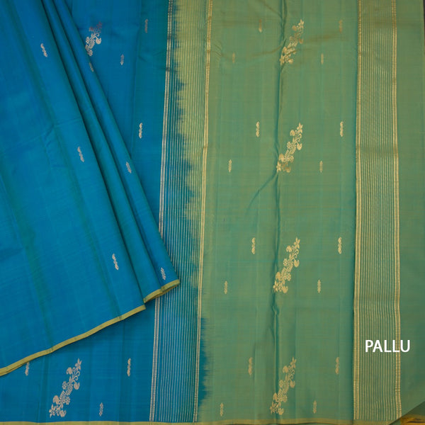 Peacock Blue Borderless Silk Saree With Zari Buttas