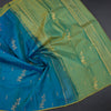 Peacock Blue Borderless Silk Saree With Zari Buttas