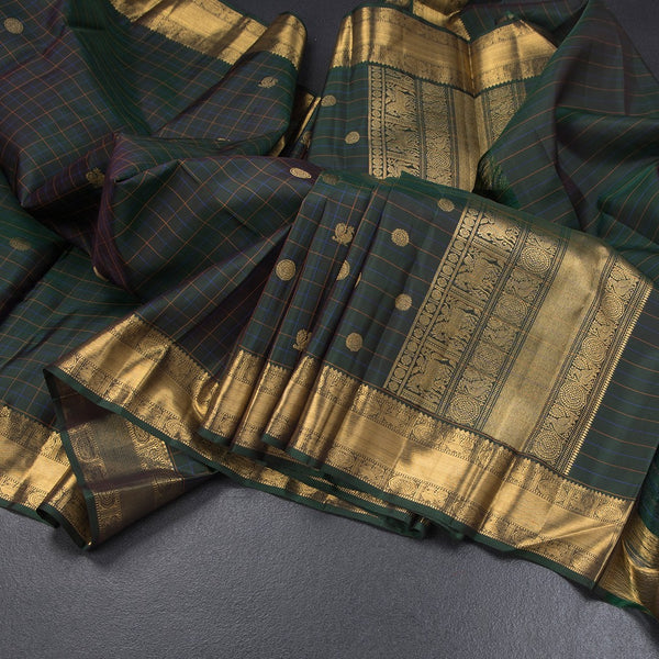 Bottle Green Checked Silk Saree With Peacock And Chakra Buttas And Zari Border