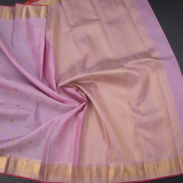 Light Pink Silk Saree With Chakra Buttas And Gold Zari Border