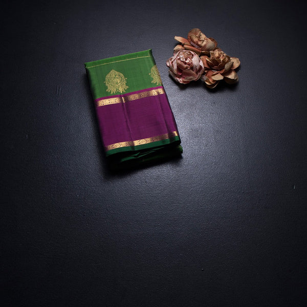 Parrot Green Checked Silk Saree And Rettapet Border
