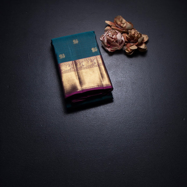 Peacock Blue Stripes Silk Saree With Peacock Design And Gold Zari Border