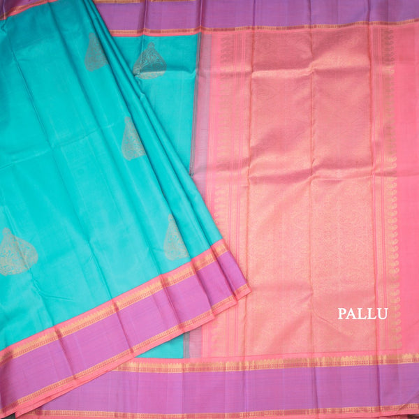 Turquoise Blue Silk Saree With Peacock Design And Thread Border