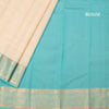 KSSMLSR42234-4-Cream-Checked-Silk-Saree-With-Peacock-And-Chakra-Buttas-And-Gold-Zari-Border-blouse