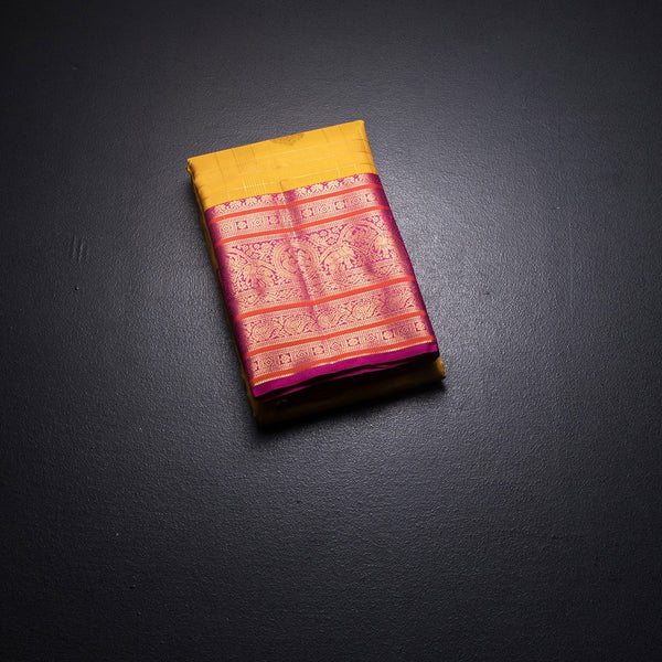 KSSMLSR42245-1-Mango-Yellow-Zari-Checked-Silk-Saree-And-Pink-Gold-Zari-Border-fold