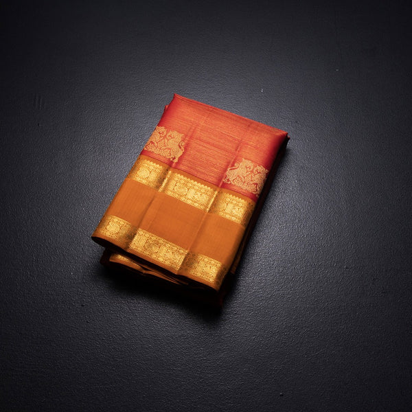 KSSMLSR42352-1-Reddish-Orange-Vairaoosi-Silk-Saree-With-Buttas-And-Yazhi-Design-And-Rettapet-Border-fold
