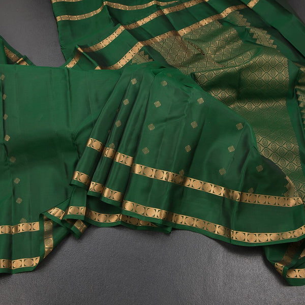KSSMLSR42472-Dark-Green-Silk-Saree-With-Zari-Buttas-And-Rettapet-Border-main