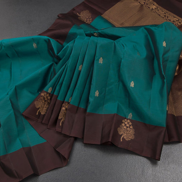 KSSMLSR42484-Peacock-Green-Silk-Saree-With-Zari-Buttas-And-Border-In-Floral-Design-main