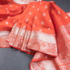 Reddish Orange Soft Silk Saree With Peacock And Mango Buttas In Silver Zari And Animal Motif On Border