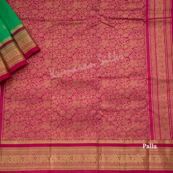 Pure Silk Parrot Green Saree With Gold Zari Buttas And Contrast Border - Kumaran Silks
