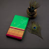 Pure Silk Parrot Green Saree With Gold Zari Buttas And Contrast Border