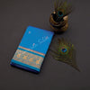 Pure Silk Azure Blue Saree With Gold Zari Buttas And Blue Border