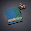 Poly Cotton Blue Plain Saree With Zig Zag Design Zari Border