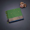 Kanchi Cotton Parrot Green Saree With Zari Buttas And Zari Border