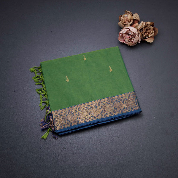 Kanchi Cotton Parrot Green Saree With Zari Buttas And Zari Border