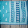 Semi Raw Silk Light Peacock Blue Printed With Zari Stripes Saree