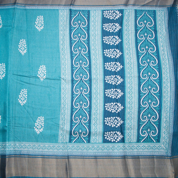 Semi Raw Silk Light Peacock Blue Printed With Zari Stripes Saree