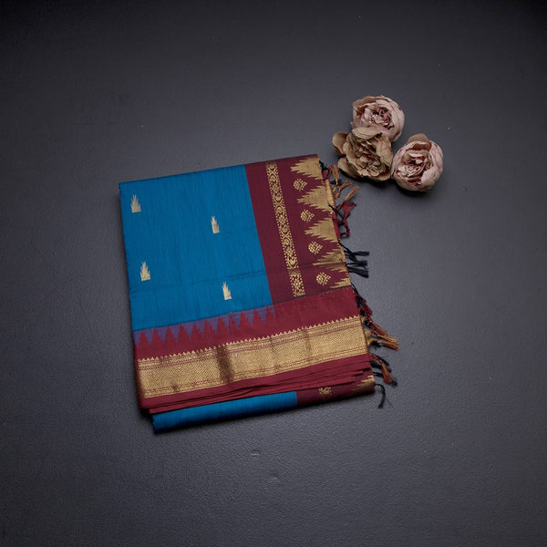 Kalyani Cotton Peacock Blue Saree With Zari Buttas And Temple Border