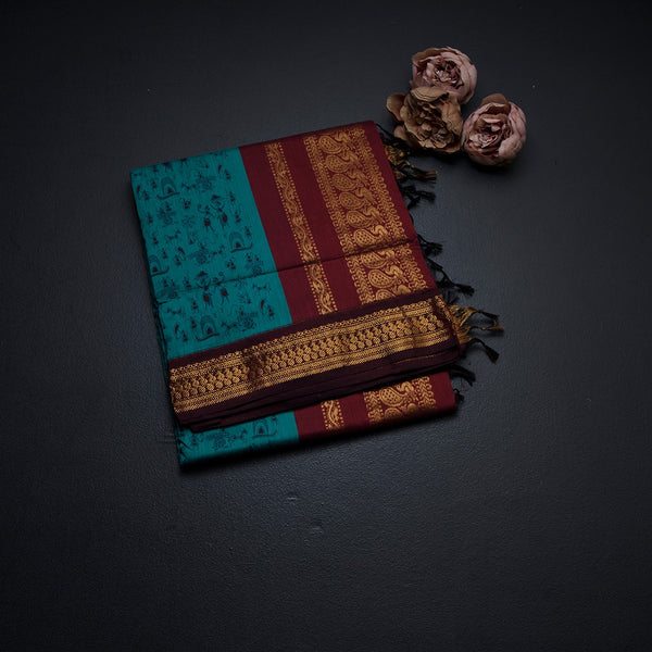 Kalyani Cotton Peacock Blue Printed Saree With Zari Border