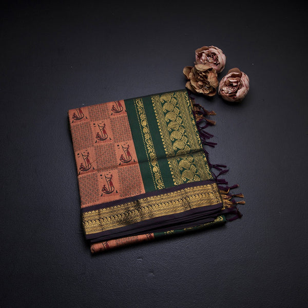 Kalyani Cotton Peach Printed Saree With Zari Border